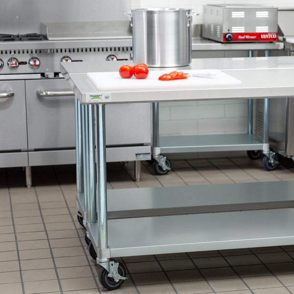 Regency 24" x 48" 18-Gauge 304 Stainless Steel Commercial Work Table with Galvanized Legs, Undershel