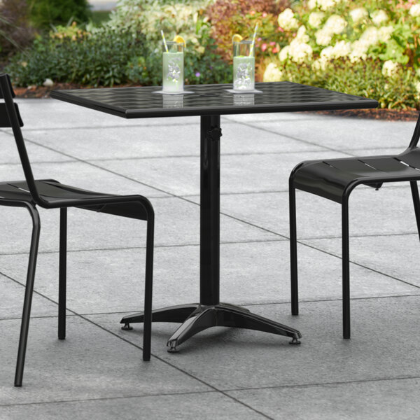 Lancaster Table & Seating 24" x 32" Black Powder-Coated Aluminum Dining Height Outdoor Table with Um